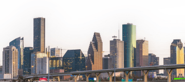 Houston, Texas, skyline with tall buildings and highway bridge